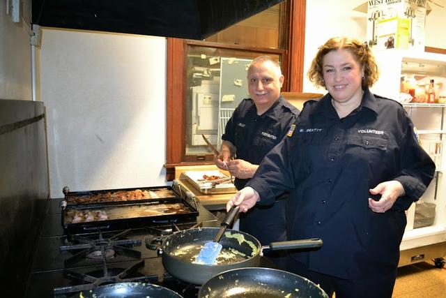 Whitney and Steve cooking breakfast